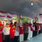 Foto : Upacara peringatan Hari Ulang Tahun (HUT) ke-80 Kemerdekaan Republik Indonesia yang digelar di lapangan fasum Blok G RW 028